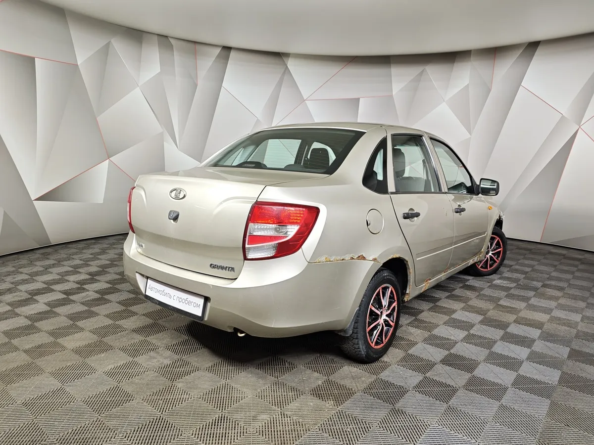 ВАЗ (Lada) Granta 1.6 AT 16кл (98 л.с.) Бежевый в АВИЛОН. Слайд №2