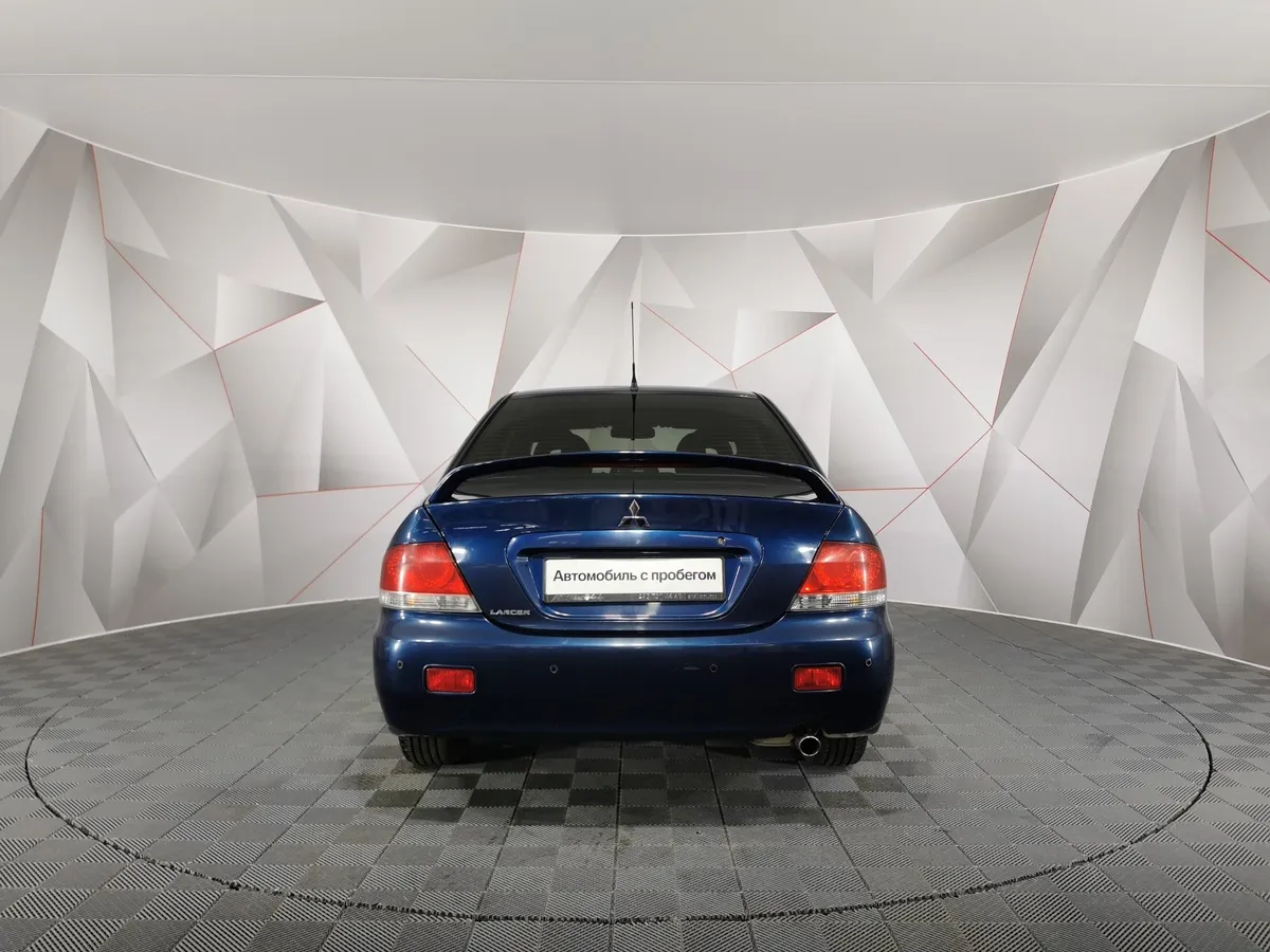 Mitsubishi Lancer 1.6 MT (100 л.с.) Синий в АВИЛОН. Слайд №8