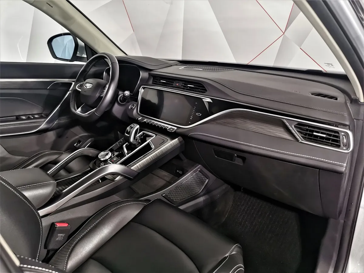 Geely Atlas Pro 1.5T 7DCT AWD (177 л.с.) Flagship+ Серый в АВИЛОН. Слайд №12