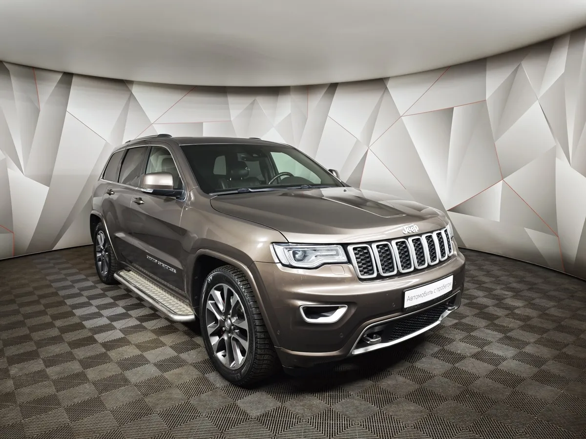 Jeep Grand Cherokee 3.6 AT AWD (286 л.с.) Overland Коричневый в АВИЛОН. Слайд №3