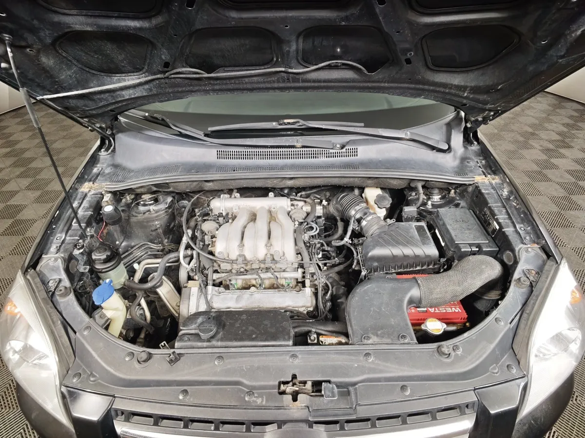 Kia Sportage 2.7 AT (175 л.с.) Черный в АВИЛОН. Слайд №11