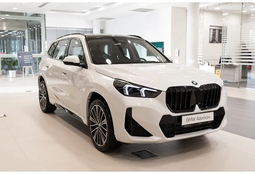 BMW X1 xDrive25 Li (204 л.с.) Белый в АВИЛОН. Слайд №2
