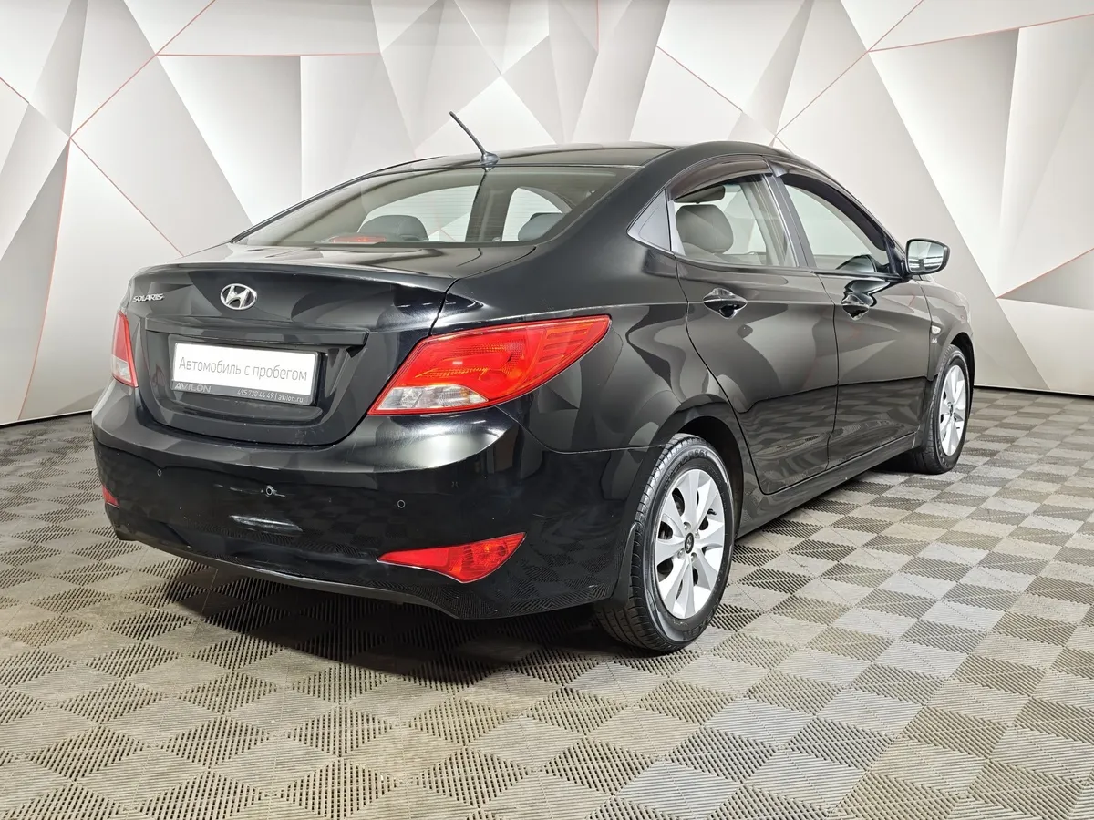 Hyundai Solaris 1.6 AT (123 л.с.) Active Plus Черный в АВИЛОН. Слайд №2
