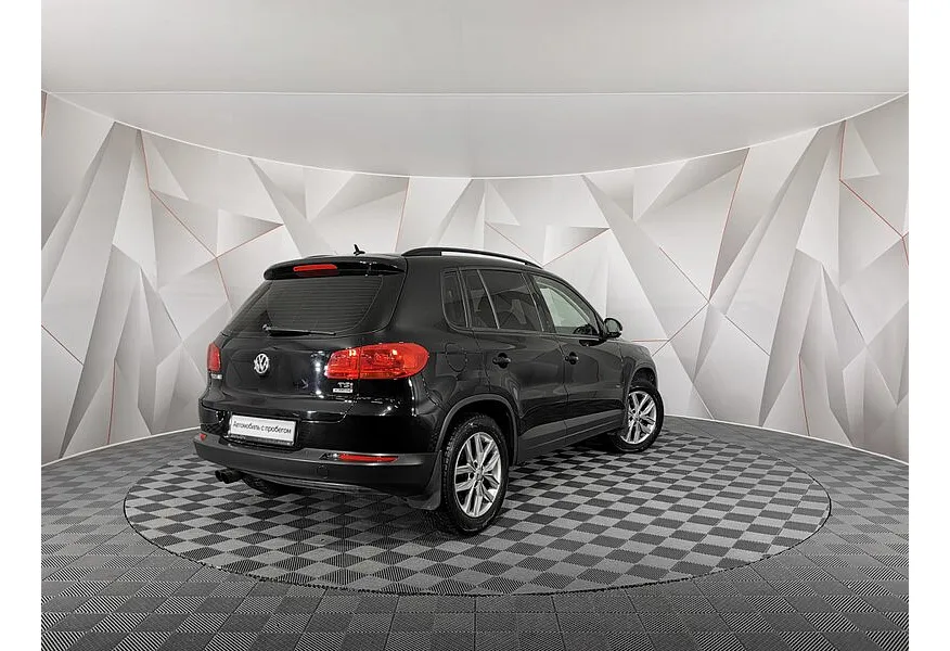 Volkswagen Tiguan 1.4 TSI BlueMotion MT (122 л.с.) Trend & Fun Черный в АВИЛОН. Слайд №2
