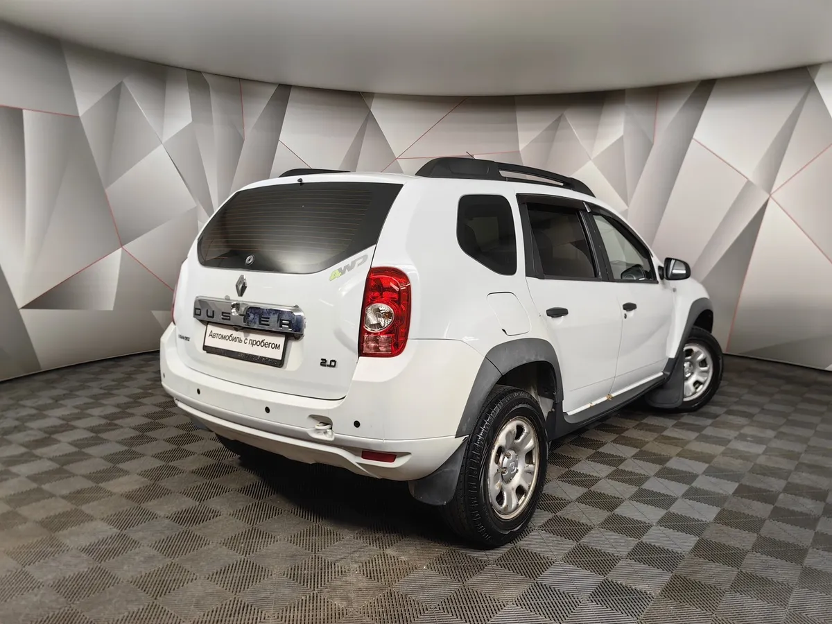 Renault Duster 2.0 MT 4x4 (143 л.с.) Белый в АВИЛОН. Слайд №2