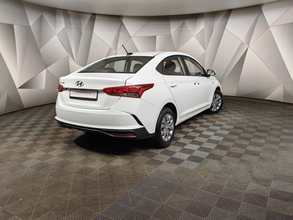 Hyundai Solaris 1.6 AT (123 л.с.) Active Plus Белый в АВИЛОН. Слайд №2