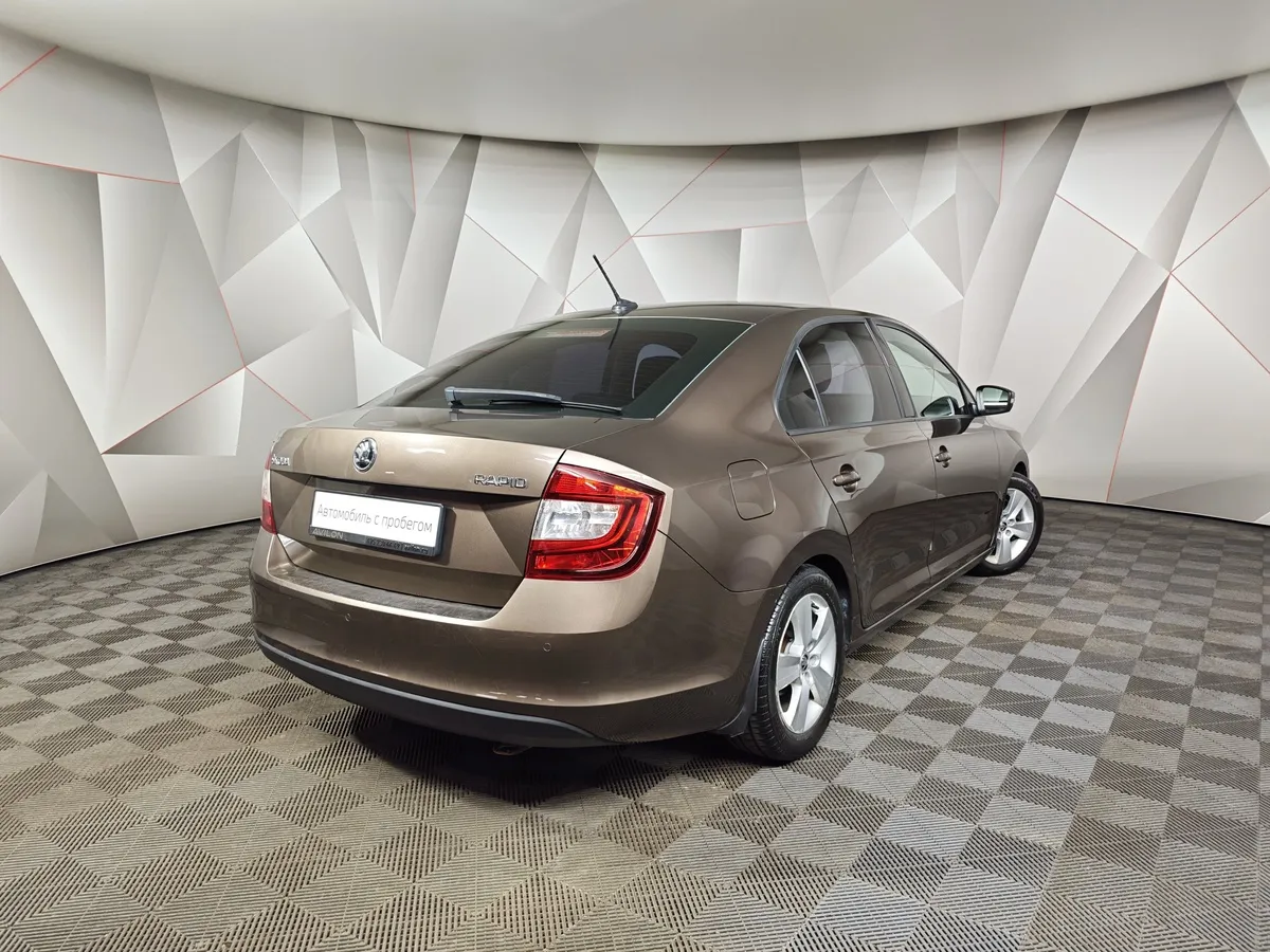 Skoda Rapid 1.6 AT (110 л.с.) Active Коричневый в АВИЛОН. Слайд №2