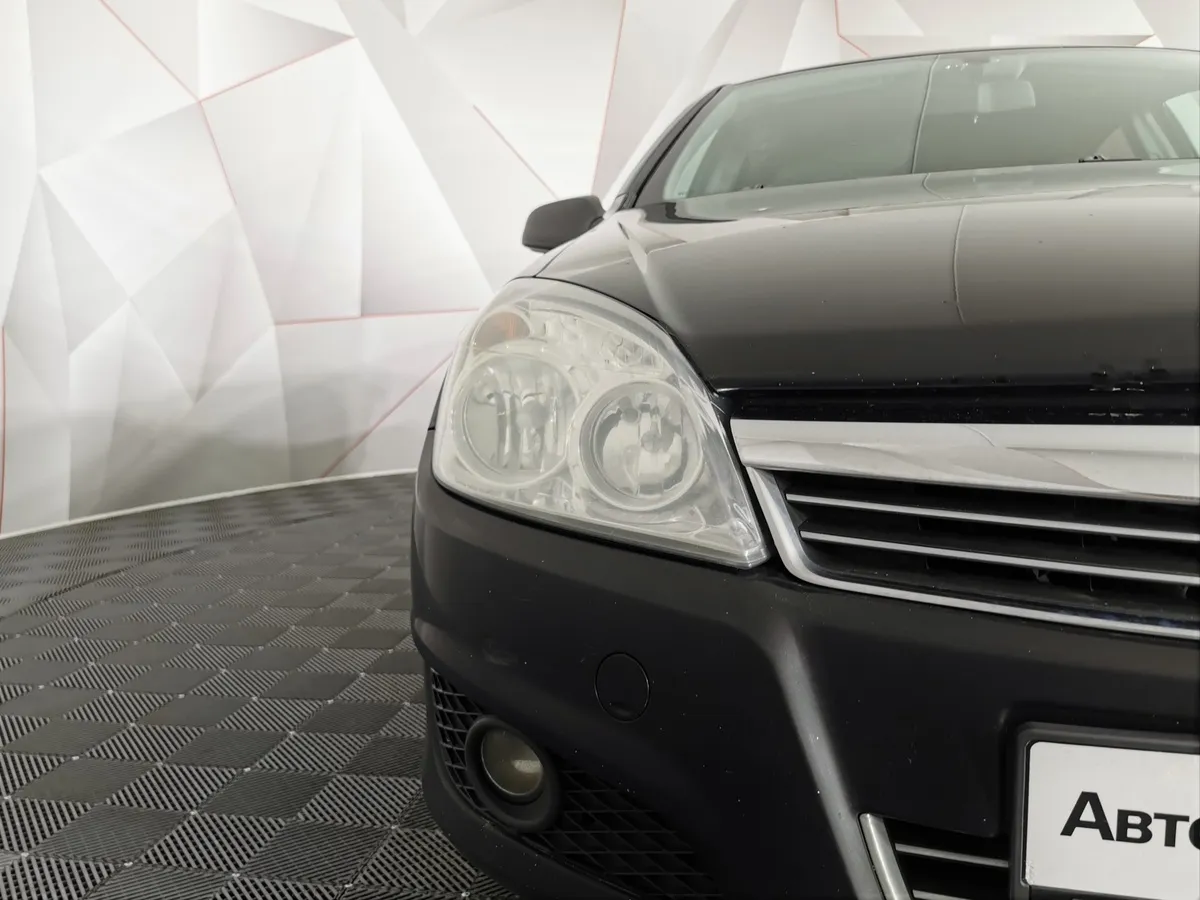 Opel Astra 1.8 AT (140 л.с.) base Черный в АВИЛОН. Слайд №10