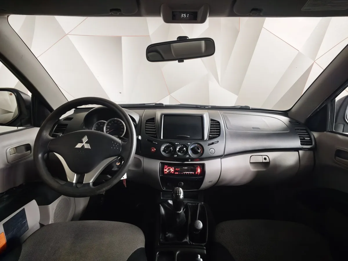 Mitsubishi L200 2.5 DI-D MT 4WD (136 л.с.) Серый в АВИЛОН. Слайд №11