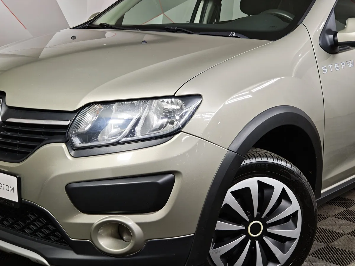 Renault Sandero 1.6 AT (103 л.с.) Stepway Бежевый в АВИЛОН. Слайд №10