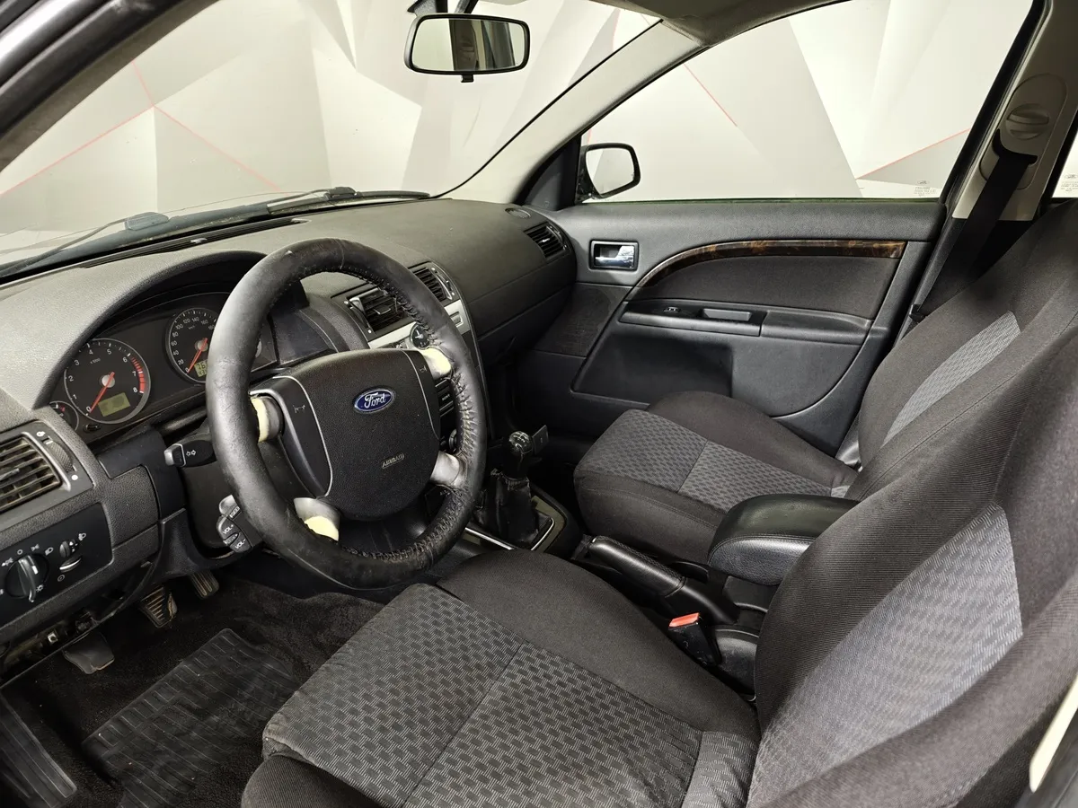 Ford Mondeo 2.0 MT (145 л.с.) Черный в АВИЛОН. Слайд №15