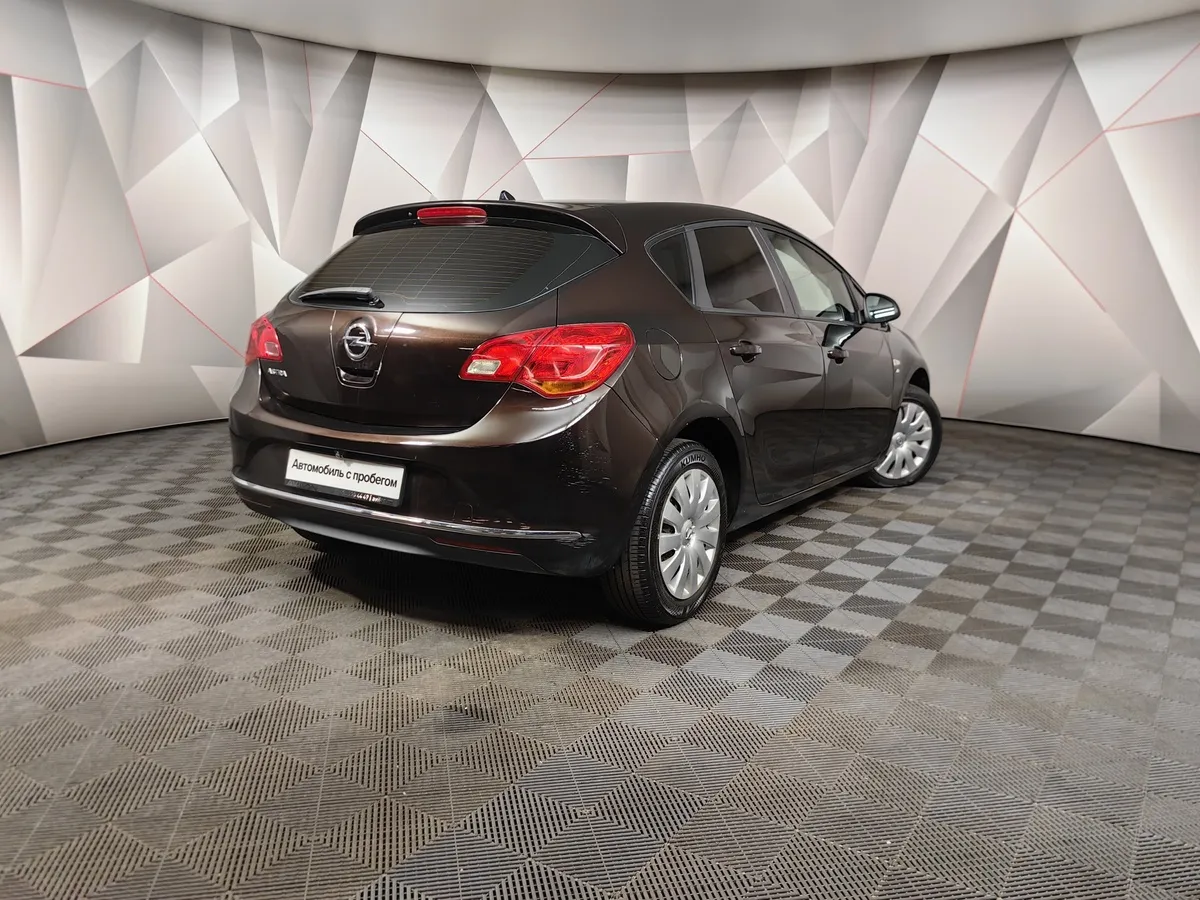 Opel Astra 1.6 MT (115 л.с.) Коричневый в АВИЛОН. Слайд №2