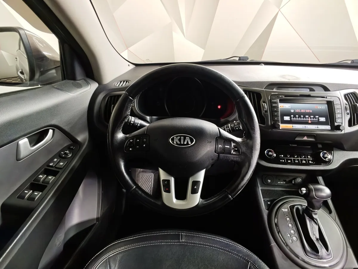 Kia Sportage 2.0 AT AWD (150 л.с.) Коричневый в АВИЛОН. Слайд №20