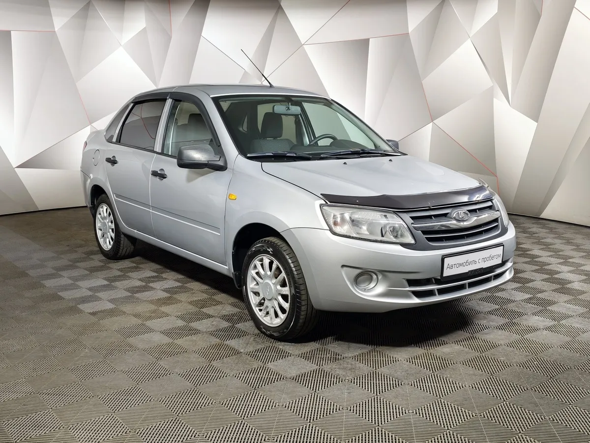 ВАЗ (Lada) Granta 1.6 MT 16кл (98 л.с.) Серебристый в АВИЛОН. Слайд №3