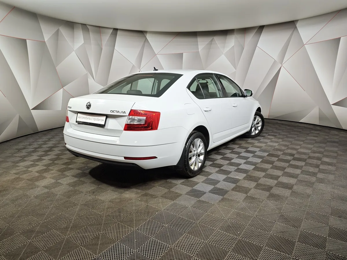 Skoda Octavia 1.6 MPI MT (110 л.с.) Белый в АВИЛОН. Слайд №2
