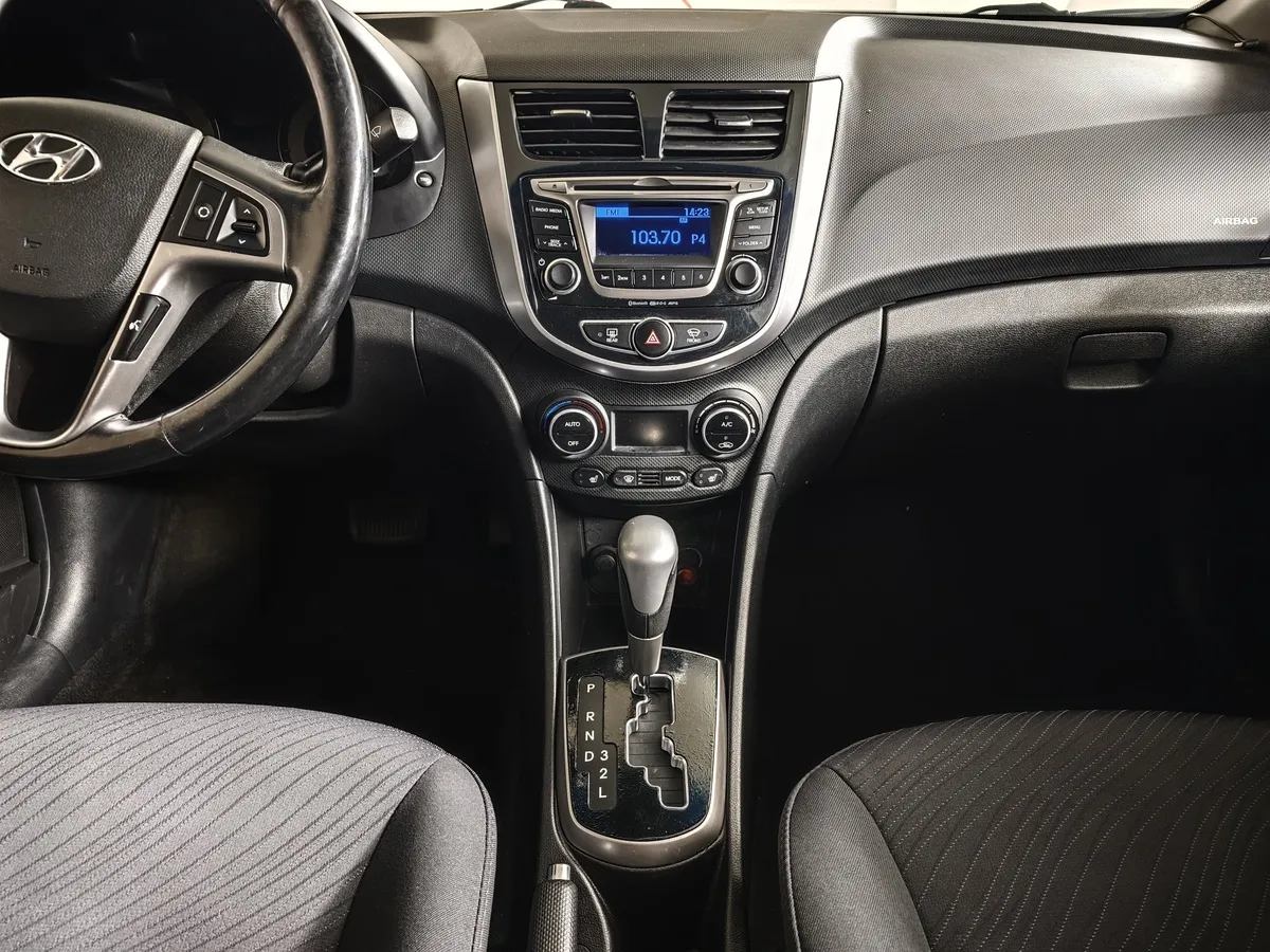 Hyundai Solaris 1.4 AT (107 л.с.) Style Черный в АВИЛОН. Слайд №14