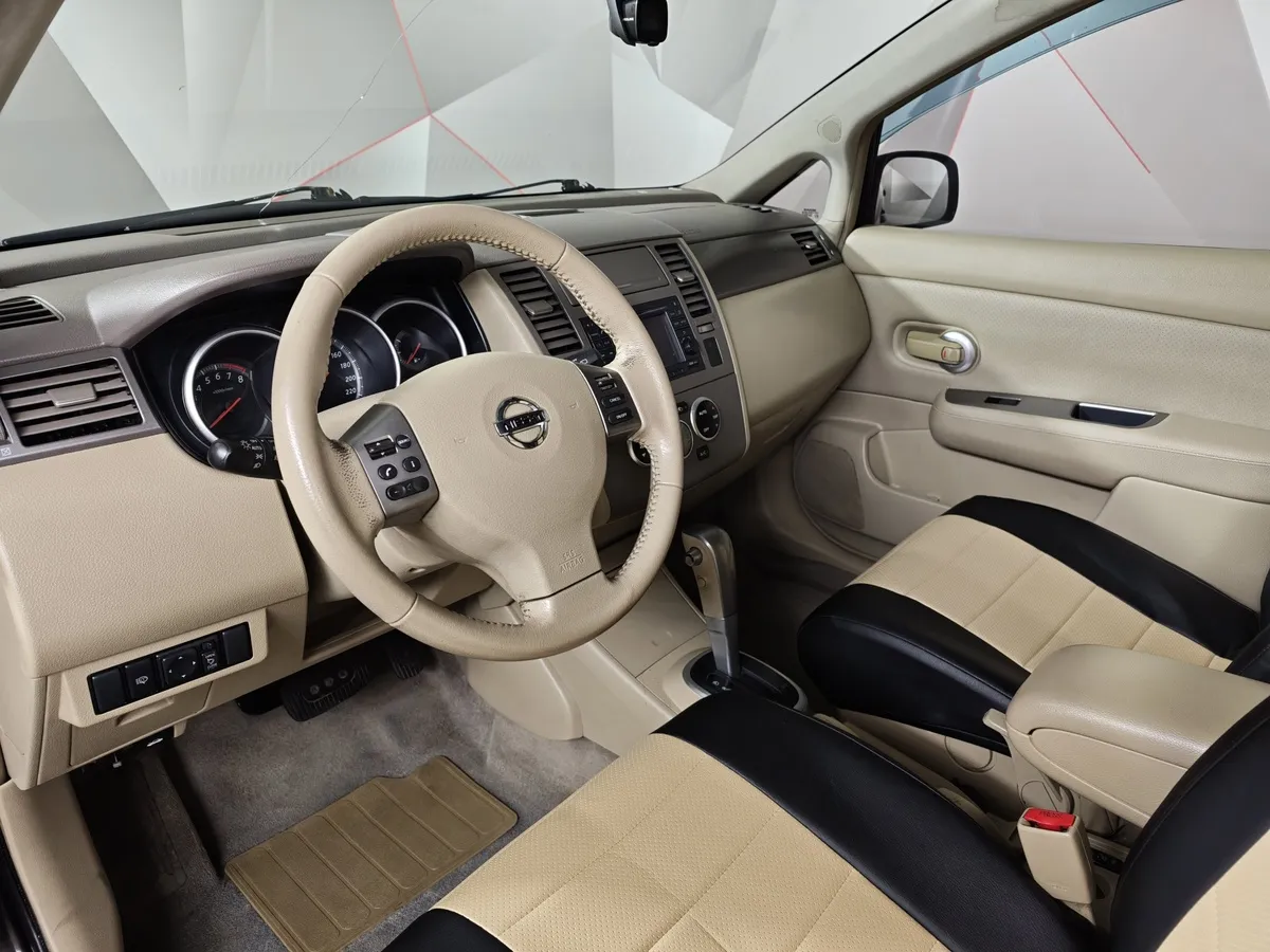 Nissan Tiida 1.6 AT (110 л.с.) Черный в АВИЛОН. Слайд №18