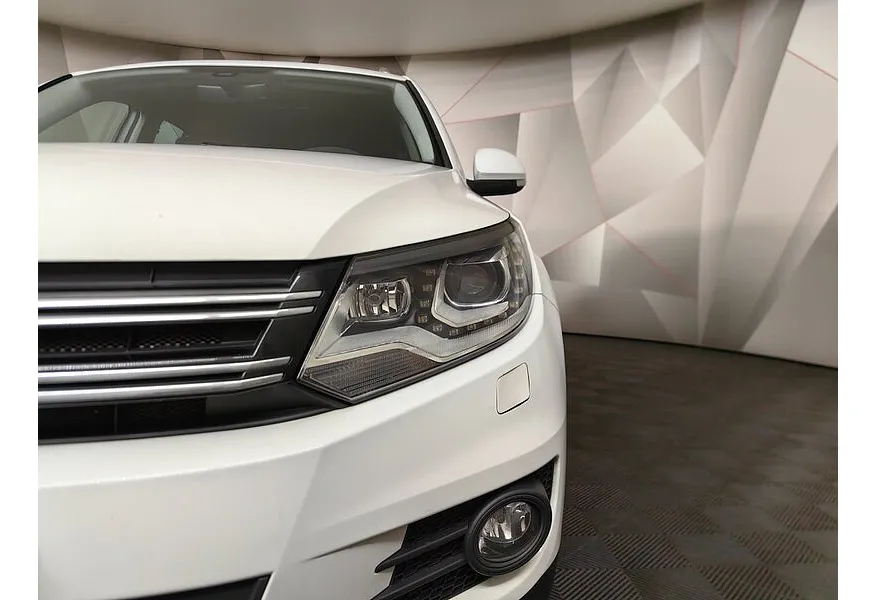 АВИЛОН - Volkswagen Tiguan 1.4 TSI BlueMotion DSG (150 л.с.) Sport & Style Белый - slide 0