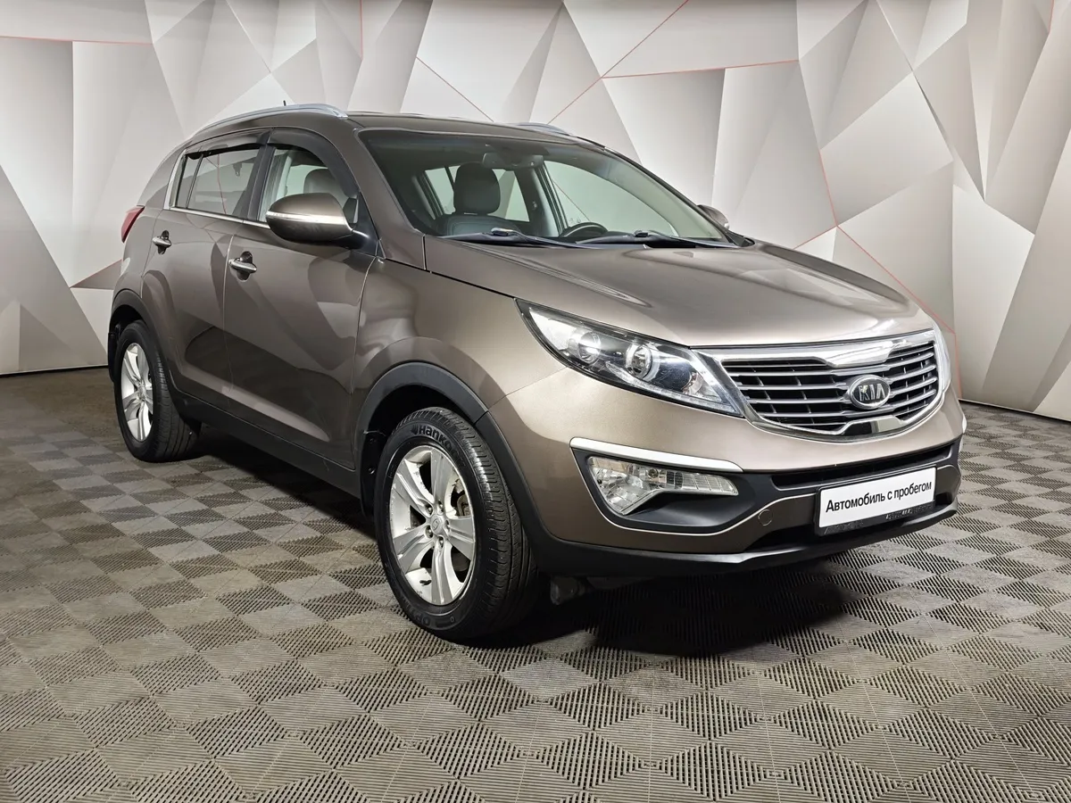 Kia Sportage 2.0 AT AWD (150 л.с.) Коричневый в АВИЛОН. Слайд №3