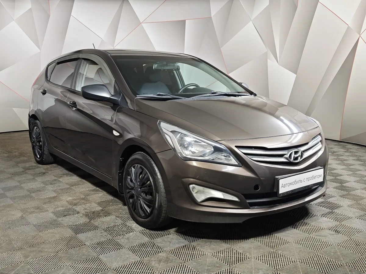 Hyundai Solaris 1.4 AT (107 л.с.) Classic Коричневый в АВИЛОН. Слайд №3