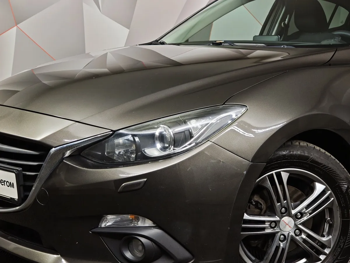 Mazda 3 1.6 AT (104 л.с.) Коричневый в АВИЛОН. Слайд №10