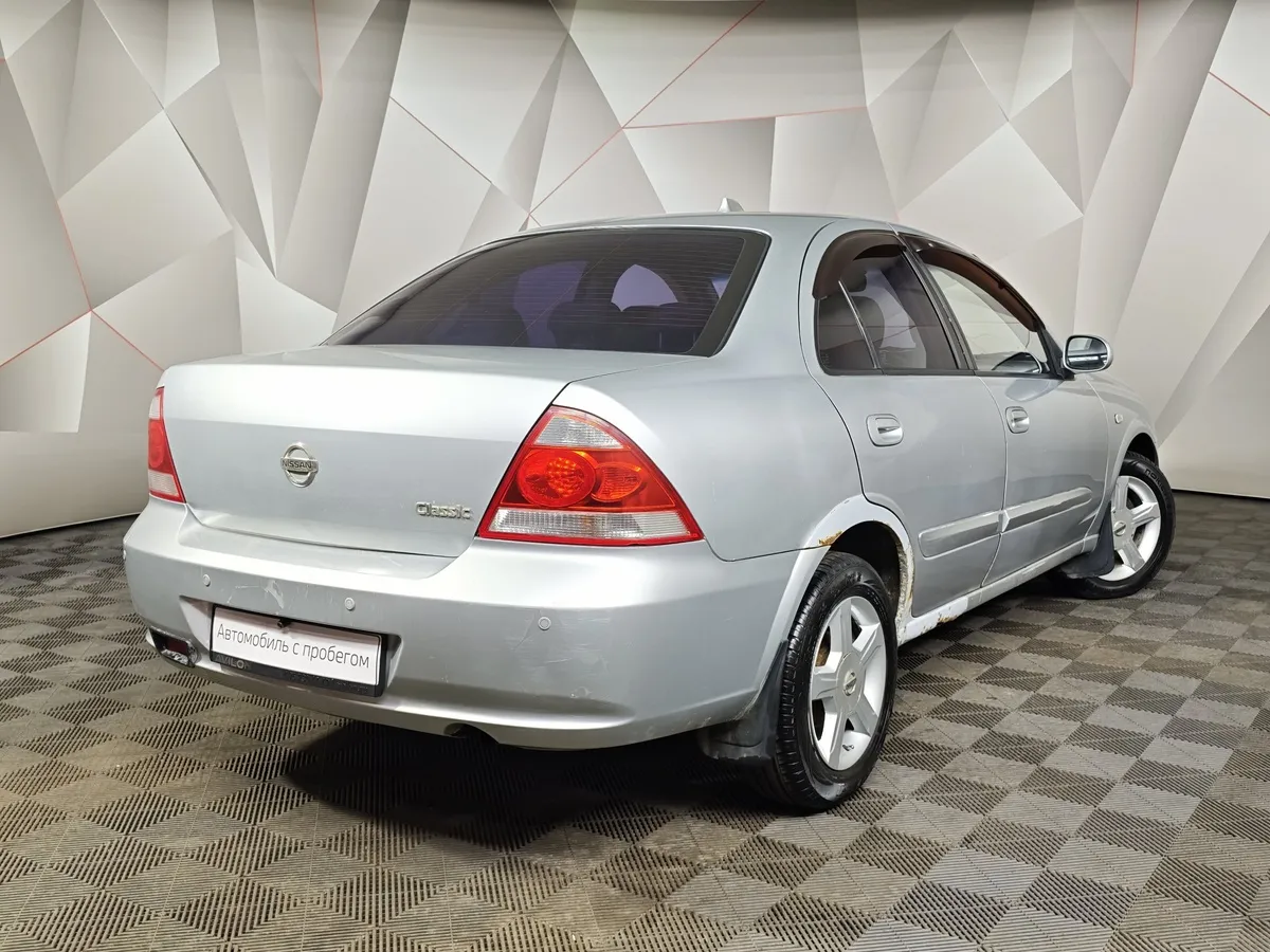 Nissan Almera Classic 1.6 AT (107 л.с.) Серебристый в АВИЛОН. Слайд №2