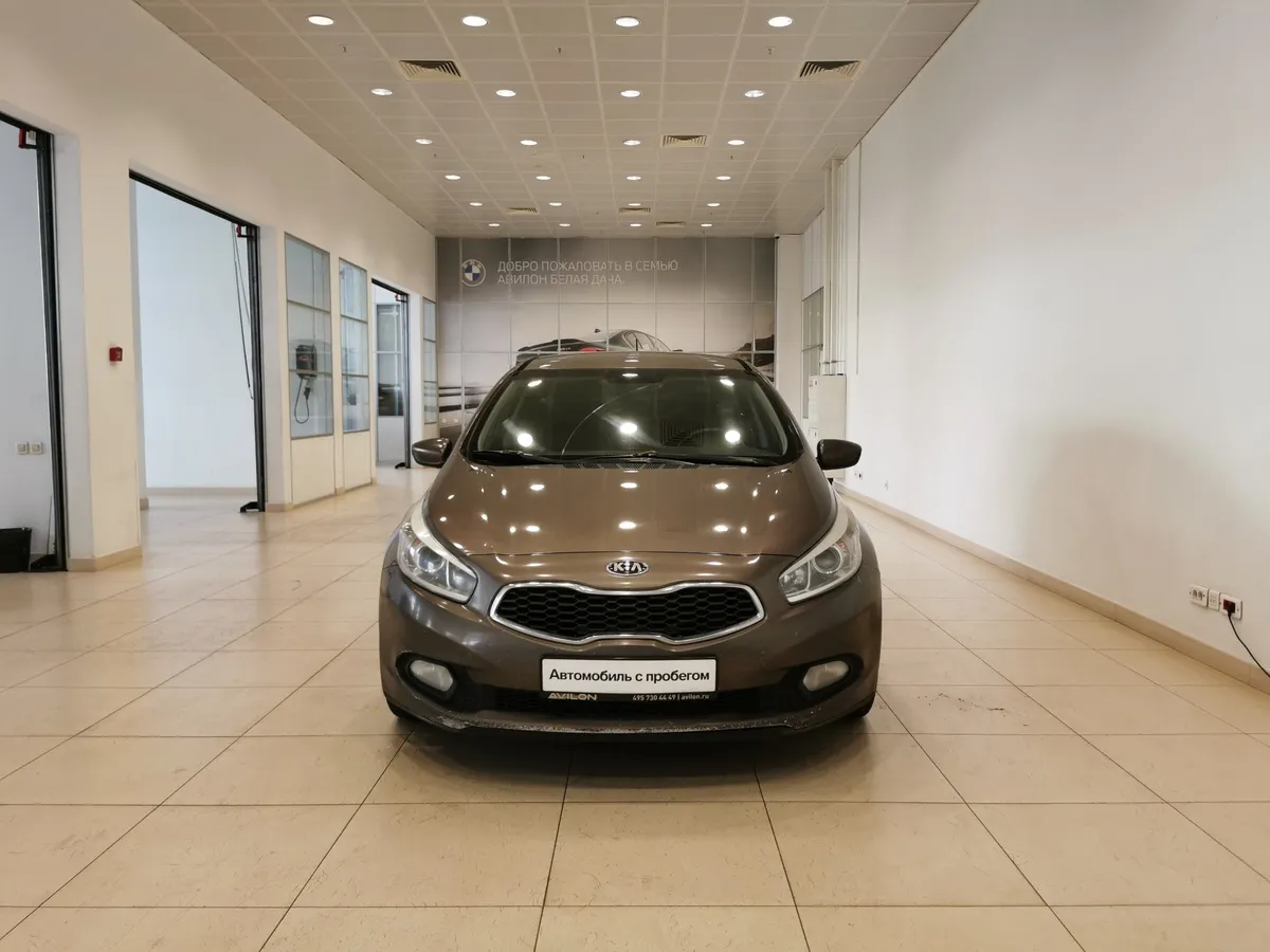 Kia Ceed 1.6 AT (129 л.с.) Коричневый в АВИЛОН. Слайд №7