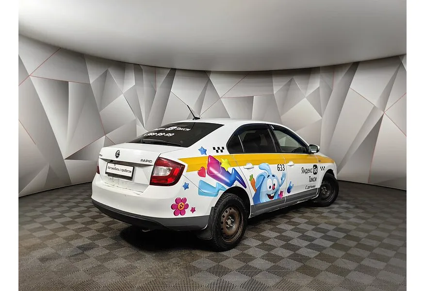 Skoda Rapid 1.6 AT (110 л.с.) Белый в АВИЛОН. Слайд №2