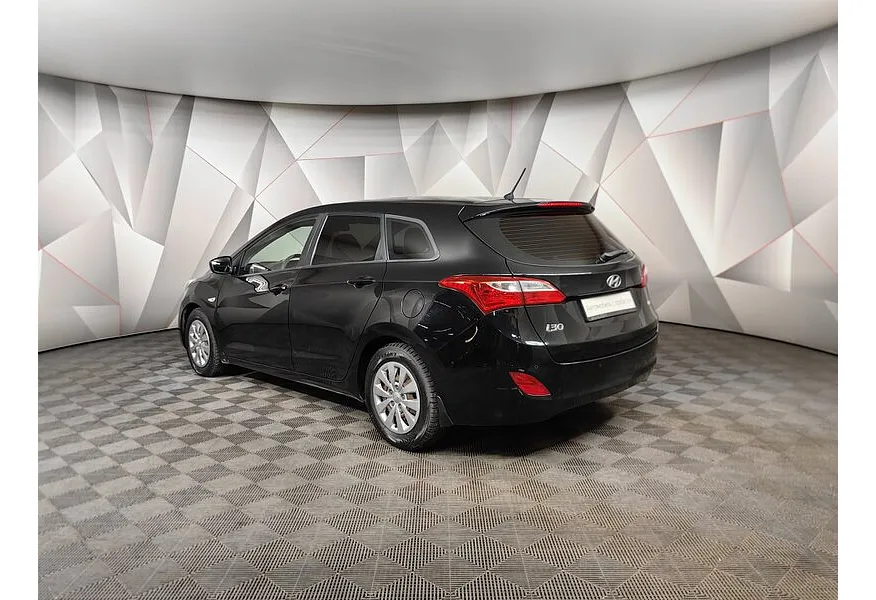 Hyundai i30 1.6 AT (126 л.с.) Черный в АВИЛОН. Слайд №4