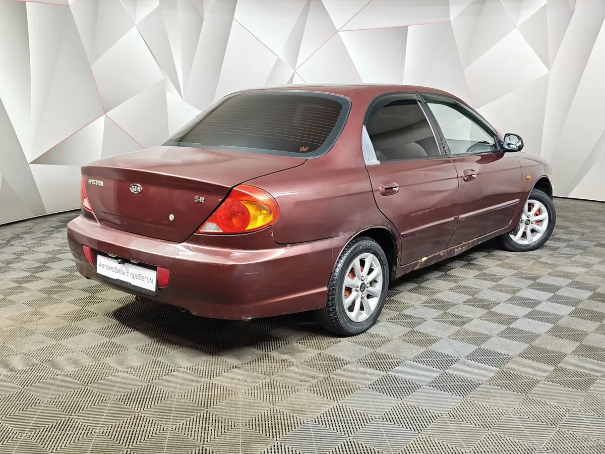 Kia Spectra 1.6 MT (101 л.с.) Красный в АВИЛОН. Слайд №2
