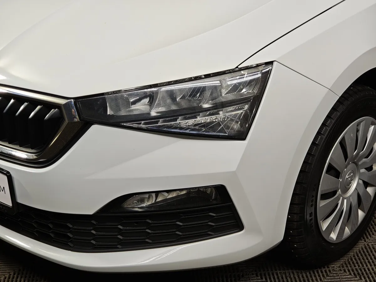 Skoda Rapid 1.6 AT (110 л.с.) Белый в АВИЛОН. Слайд №10