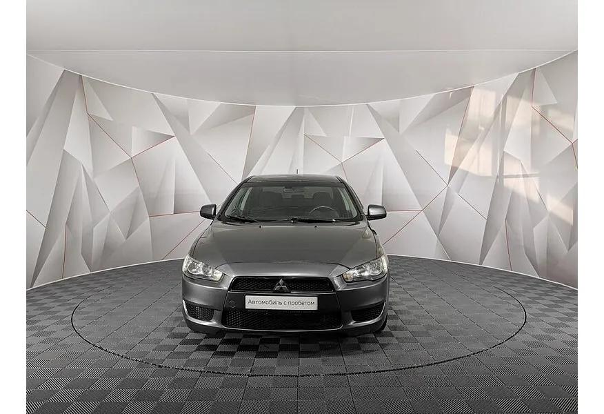 Mitsubishi Lancer 1.8 MT (143 л.с.) Серый в АВИЛОН. Слайд №7