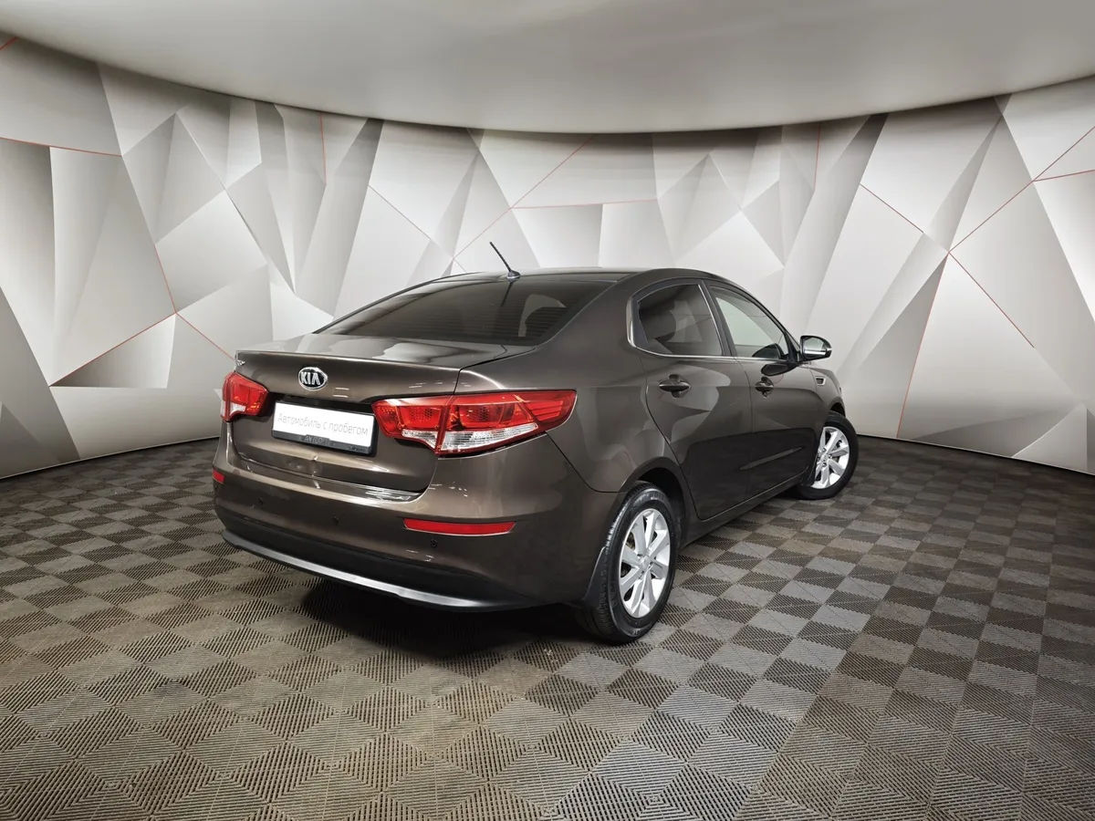 Kia Rio 1.6 AT (123 л.с.) Prestige Коричневый в АВИЛОН. Слайд №2