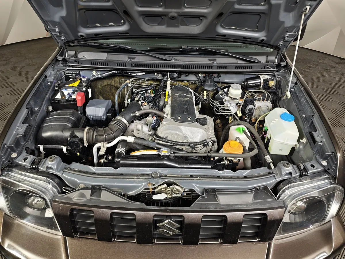 Suzuki Jimny 1.3 AT 4WD (85 л.с.) Коричневый в АВИЛОН. Слайд №11