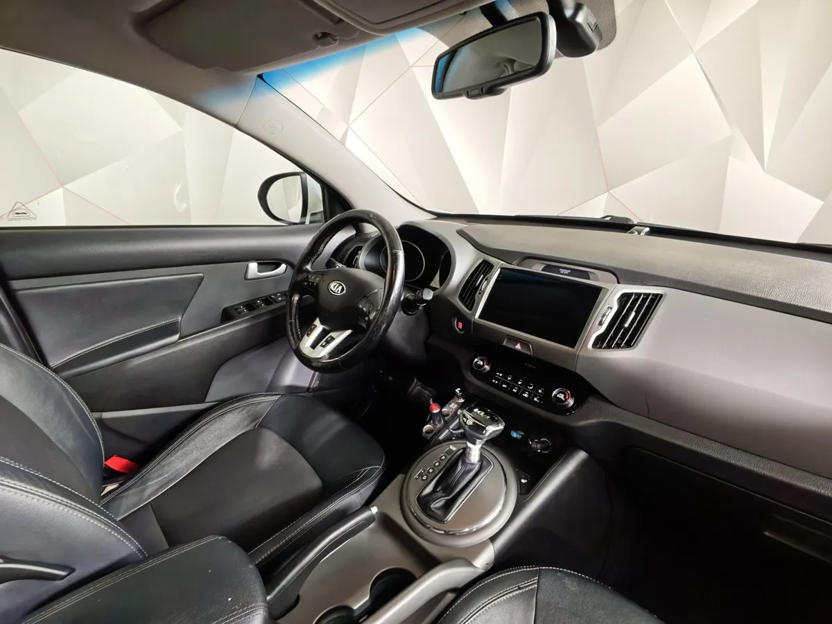 Kia Sportage 2.0 AT 4WD (150 л.с.) Luxe Белый в АВИЛОН. Слайд №13