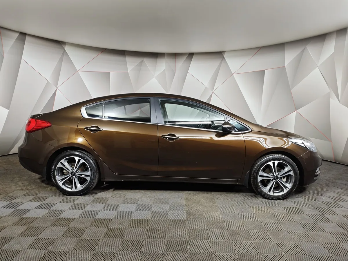 Kia Cerato 1.6 AT (130 л.с.) Коричневый в АВИЛОН. Слайд №6