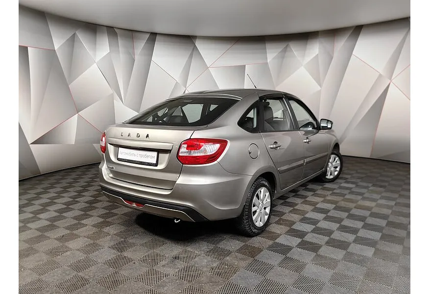 ВАЗ (Lada) Granta 1.6 MT 8кл (82 л.с.) Серый в АВИЛОН. Слайд №2