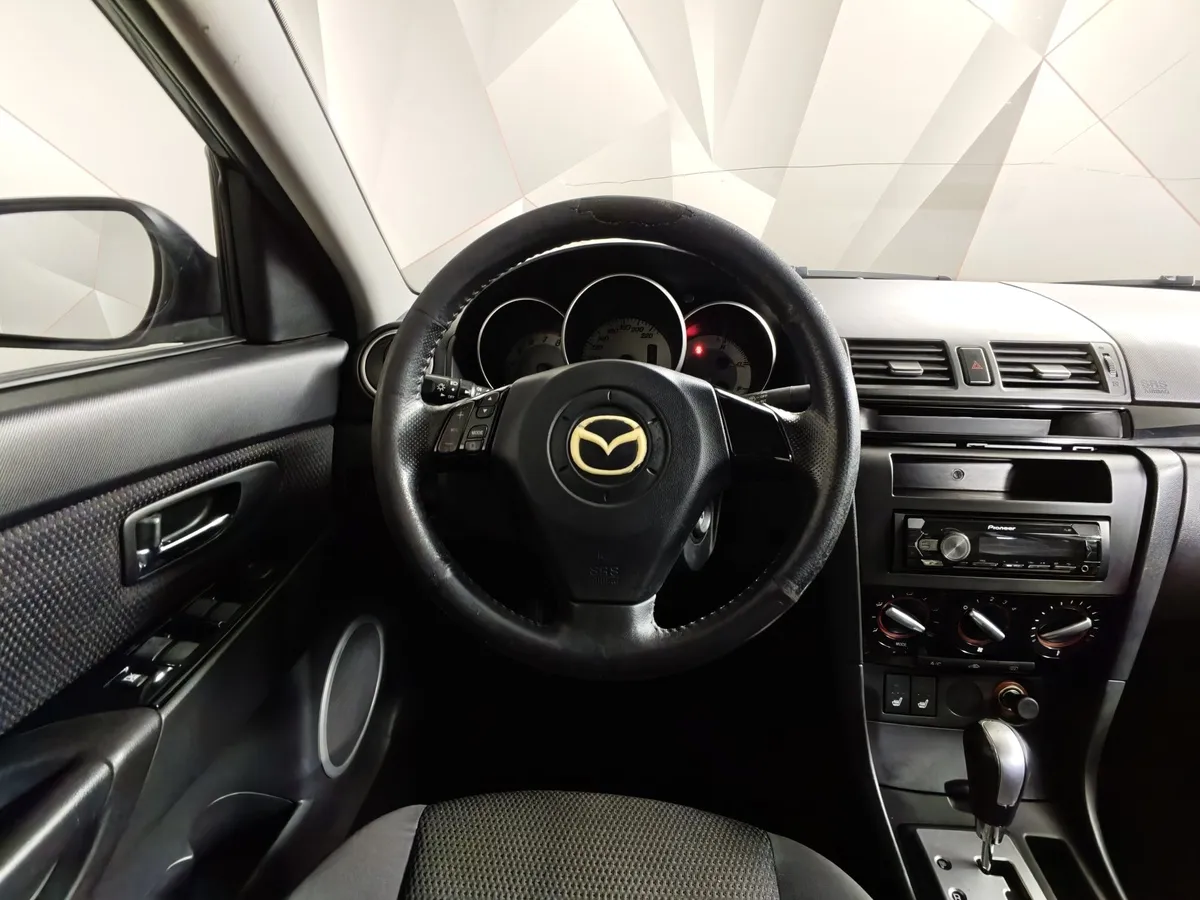 Mazda 3 1.6 AT (105 л.с.) Черный в АВИЛОН. Слайд №18
