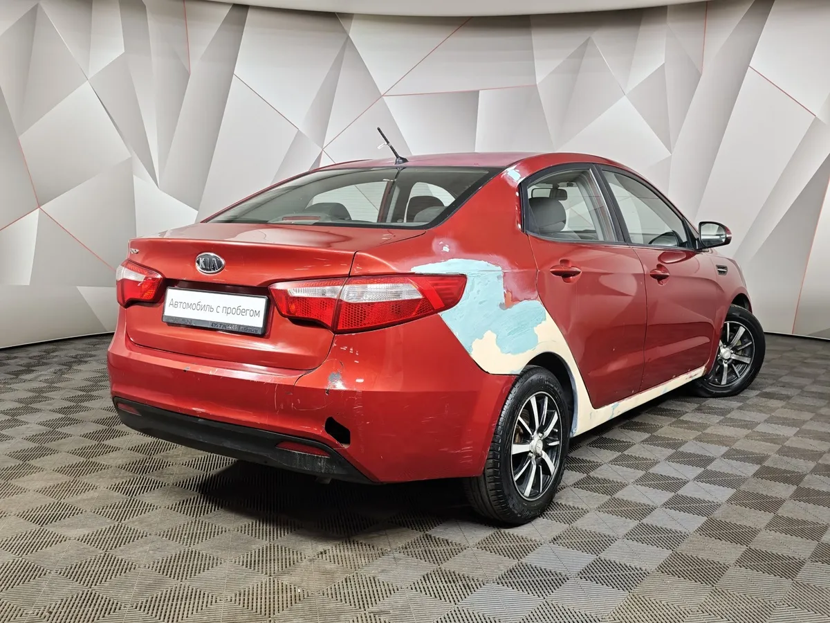 Kia Rio 1.6 MT (123 л.с.) Красный в АВИЛОН. Слайд №2