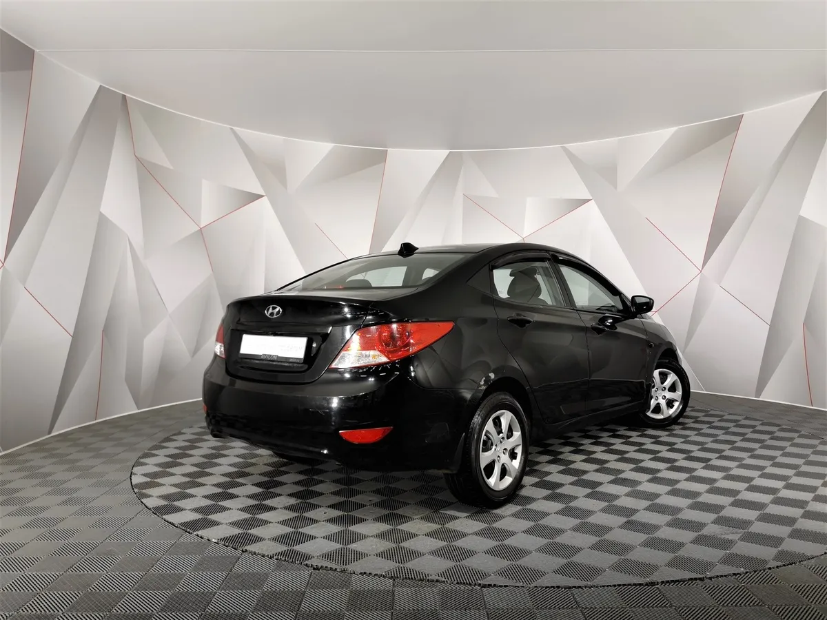 Hyundai Solaris 1.4 MT (107 л.с.) Active Черный в АВИЛОН. Слайд №2