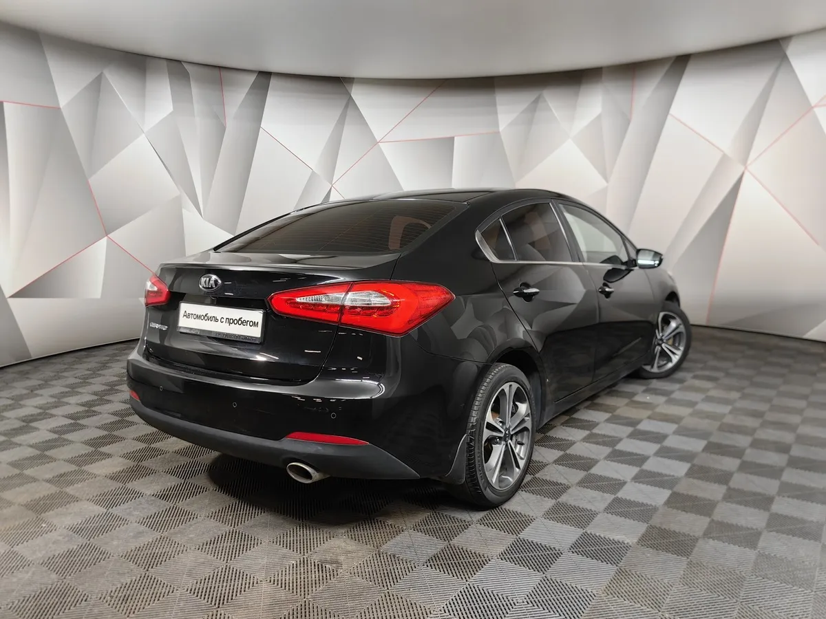 Kia Cerato 1.6 AT (130 л.с.) Черный в АВИЛОН. Слайд №2