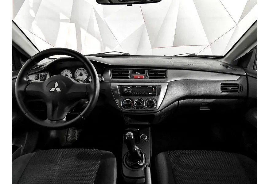 Mitsubishi Lancer 1.6 MT (100 л.с.) Синий в АВИЛОН. Слайд №13