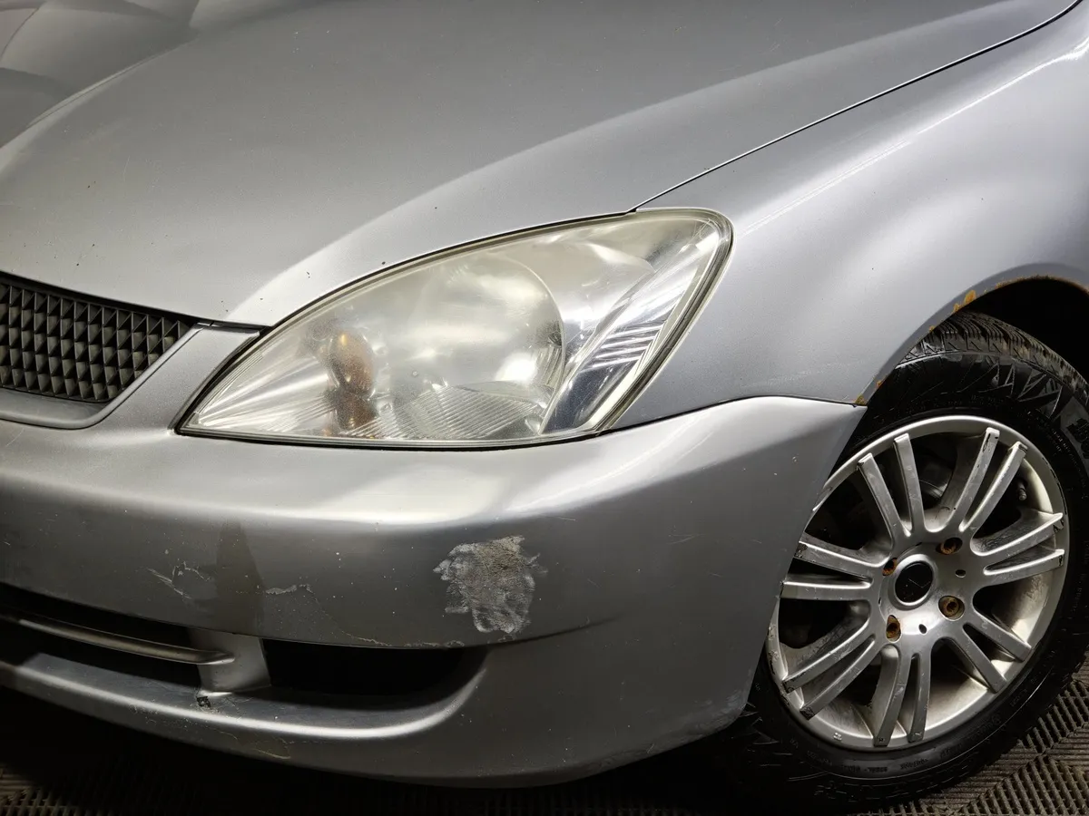 Mitsubishi Lancer 1.6 AT (98 л.с.) Серебристый в АВИЛОН. Слайд №9