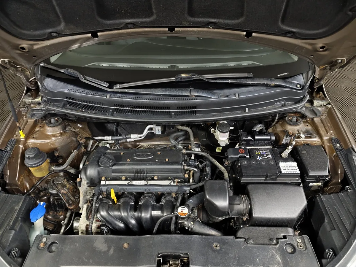 Kia Rio 1.6 AT (123 л.с.) Коричневый в АВИЛОН. Слайд №11