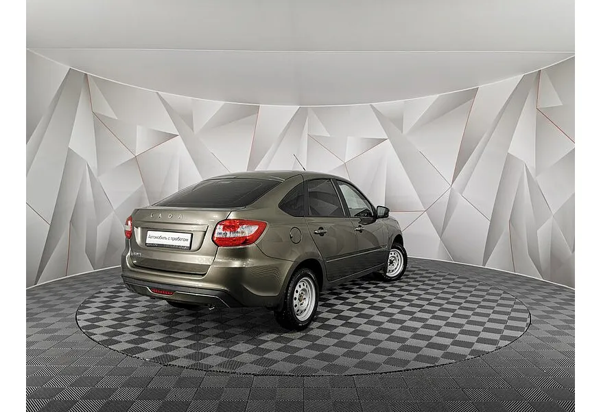 ВАЗ (Lada) Granta 1.6 MT 16 кл (106 л.с.) Коричневый в АВИЛОН. Слайд №2