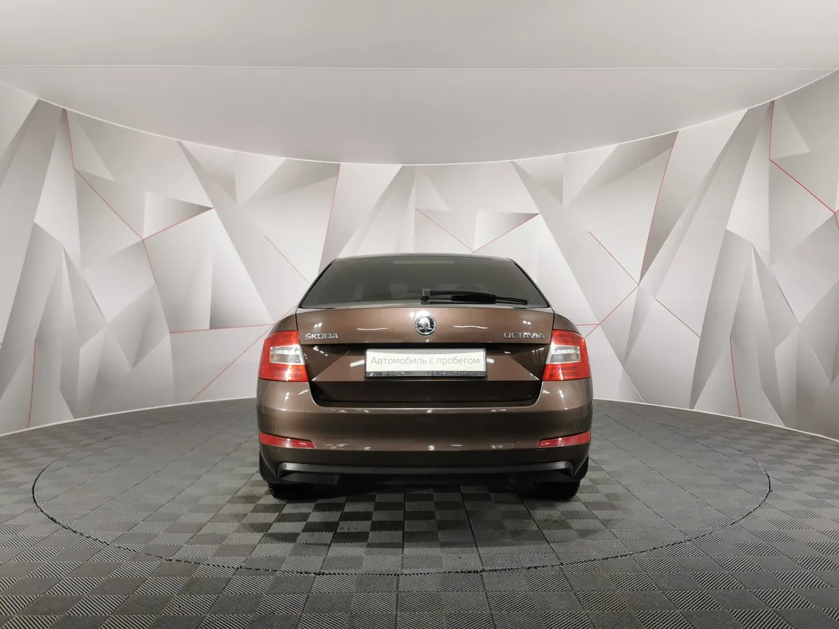 Skoda Octavia 1.6 MPI AT (110 л.с.) Коричневый в АВИЛОН. Слайд №8