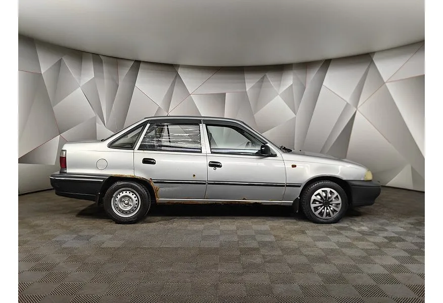 Daewoo Nexia 1.5 MT (75 л.с.) Серебристый в АВИЛОН. Слайд №6