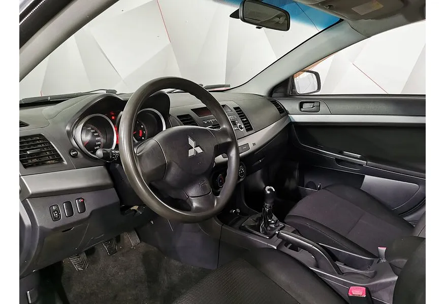 Mitsubishi Lancer 1.8 MT (143 л.с.) Серый в АВИЛОН. Слайд №18