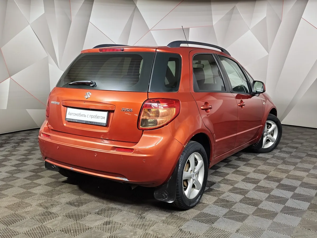 Suzuki SX4 1.6 AT (107 л.с.) Оранжевый в АВИЛОН. Слайд №2