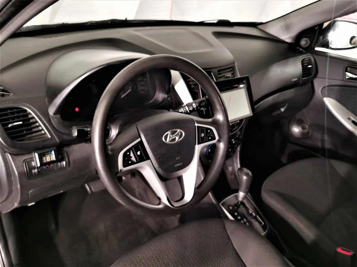 Hyundai Solaris 1.4 AT (107 л.с.) Active Бежевый в АВИЛОН. Слайд №18